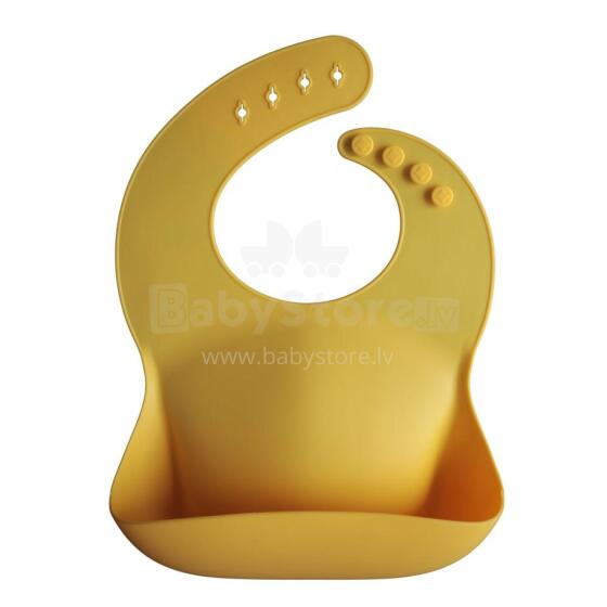 Mushie Silicone Bib Art.2500109 Yellow Beebipõll on valmistatud 100% kvaliteetsest silikoonist