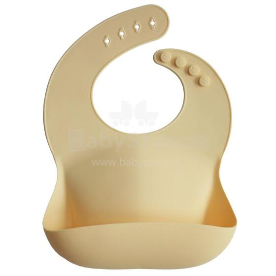 Mushie Silicone Bib Art.2500198 Yellow Beebipõll on valmistatud 100% kvaliteetsest silikoonist