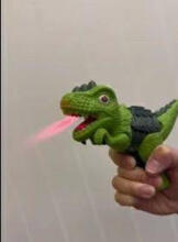 DINOZAURI PISTOLET .ŚW.DŹW.PARA